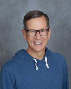 Dr. Tim Welch - Oral Surgeon, smiling at the camera